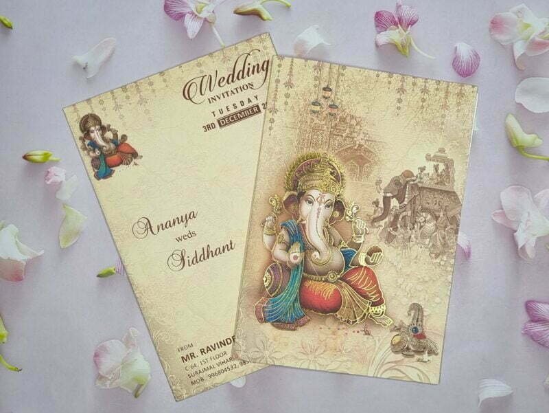 Beige Colour Ganesha With Baarat Theme Wedding Invitation Card