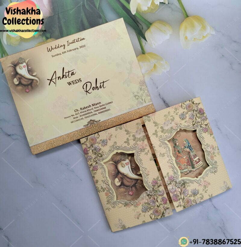 Windowed Card With Ganesh Ji And Dulah Dulhan In Tray Wedding Card