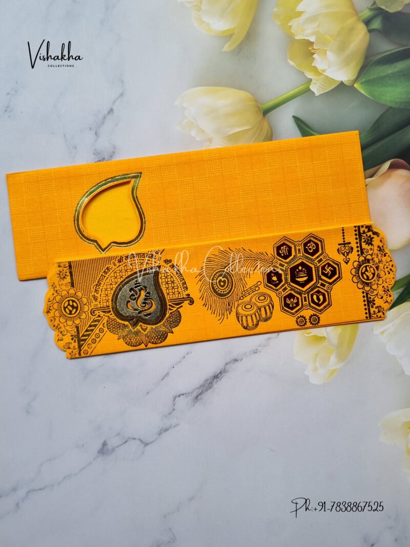 Yellow Piano style paper Scroll with Paan Ganesh Marriage card design